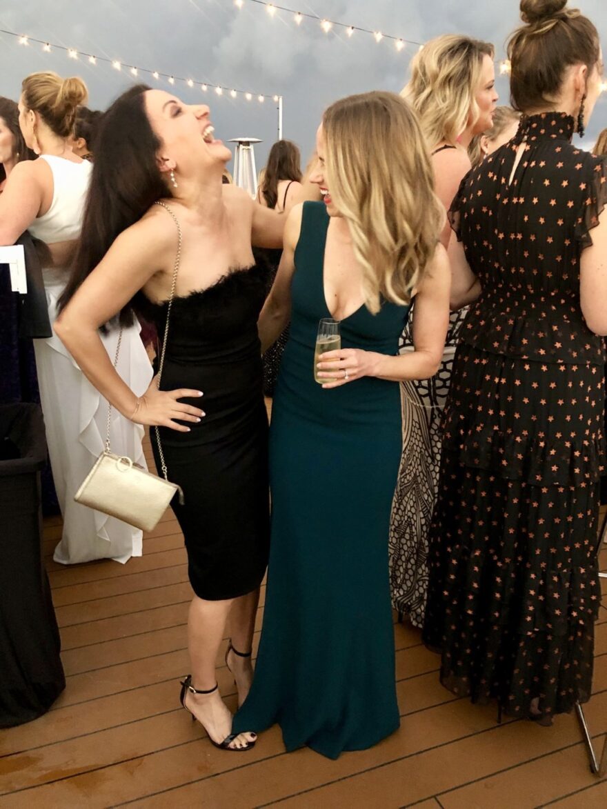 two women laughing 