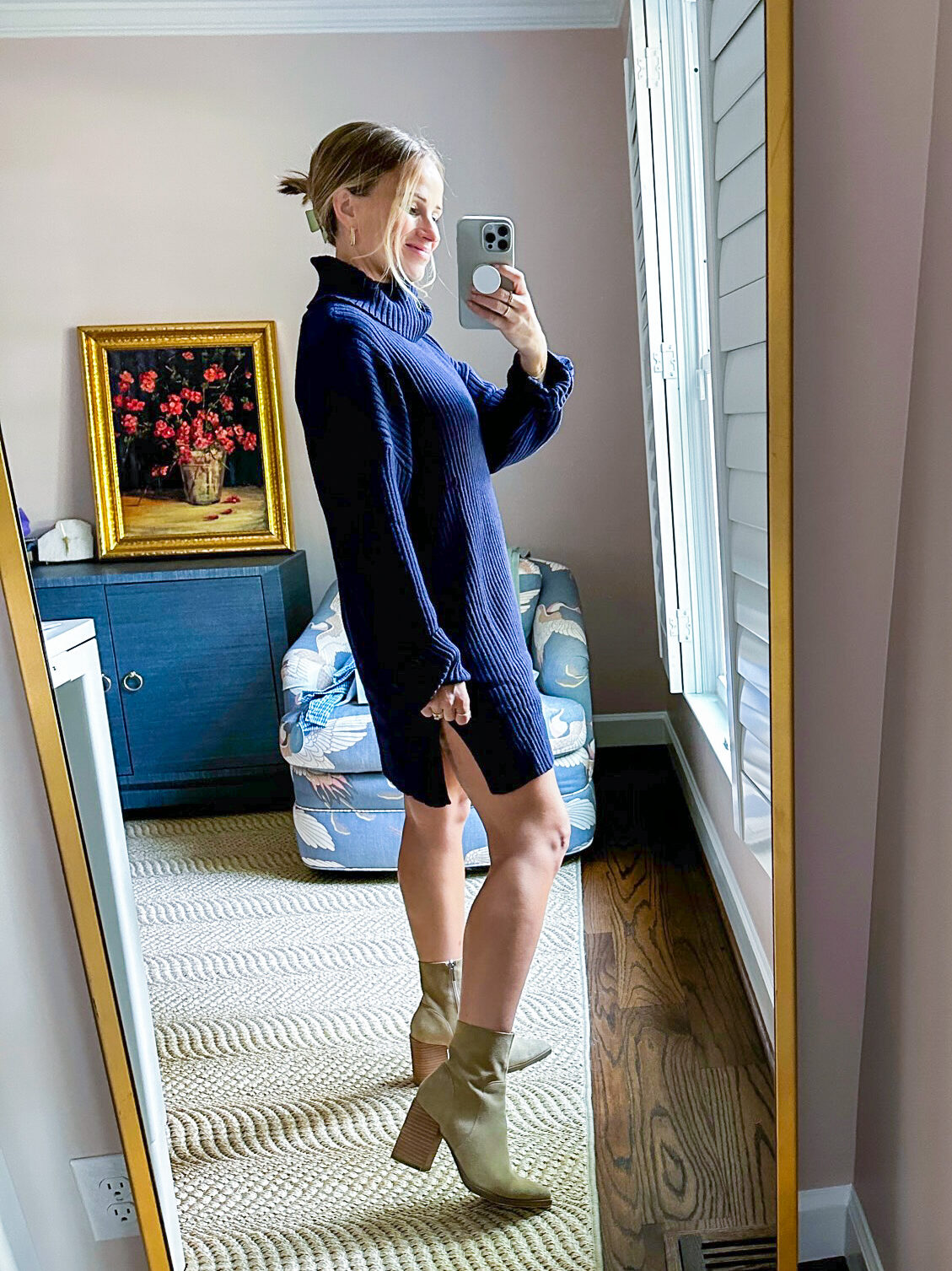 TeriLyn Adams wearing oversized sleeve sweater dress one of the Affordable Fall Dresses and boots 