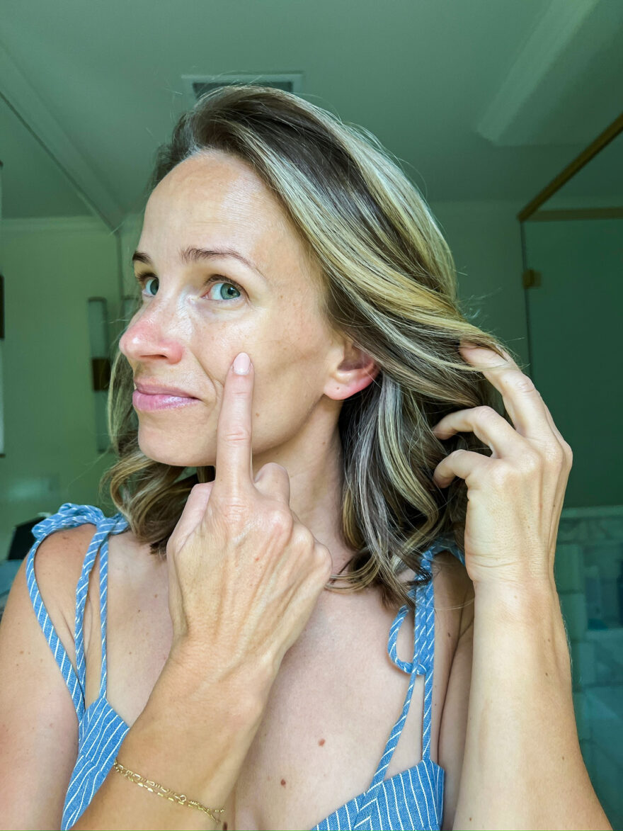 TeriLyn Adams showing before and after results of using Beautycounter All Bright Dark Spot Minimizer  on the cheeks 
