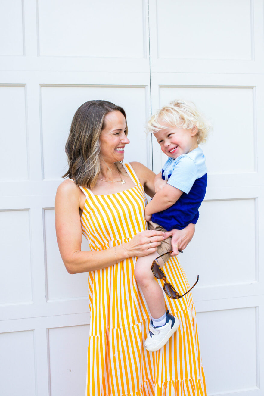 TeriLyn Adams carrying her son 