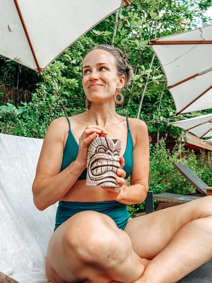 TeriLyn Adams drinking near the pool 