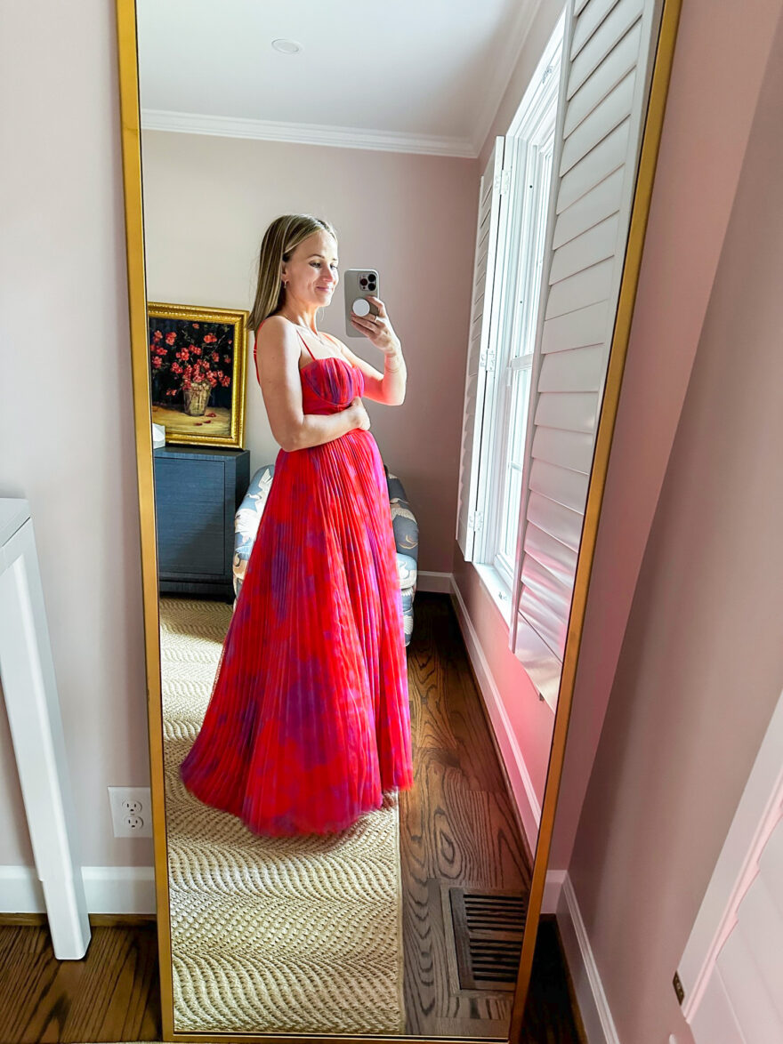 woman wearing Hutch Amara Floral Bustier Pleated Fit & Flare Dress Nordstrom Wedding Guest Dresses