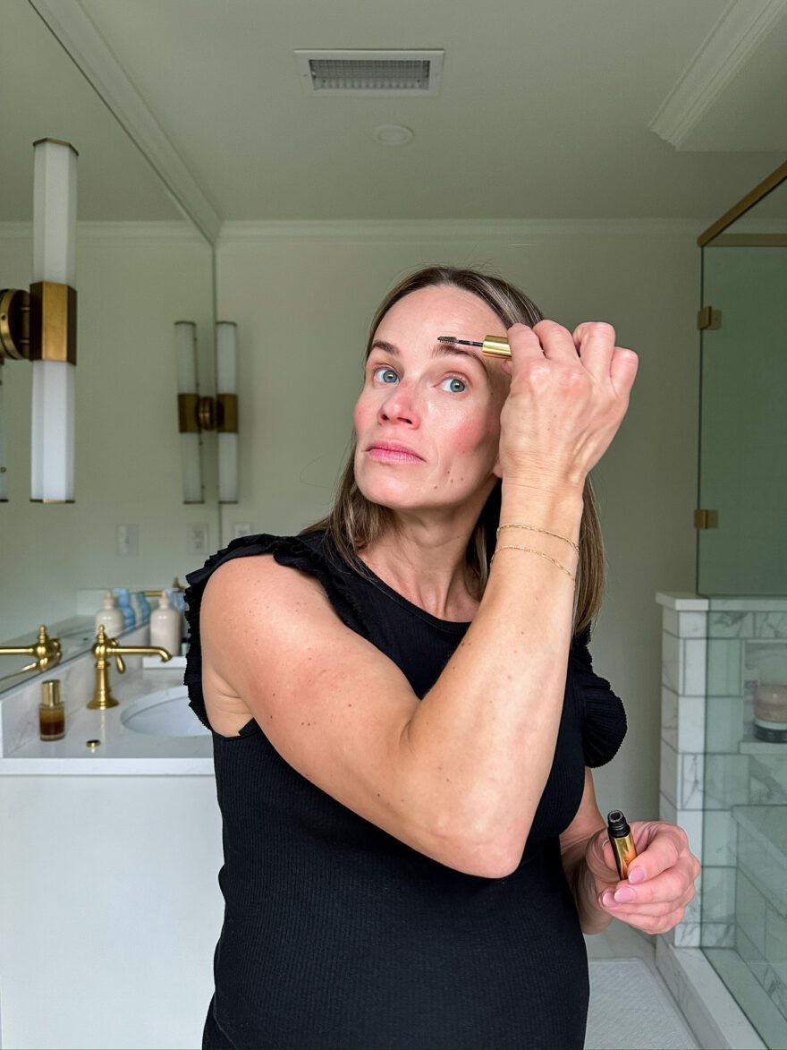TeriLyn Adams using the Brow 1980 Volumizing Pomade from Merit Beauty