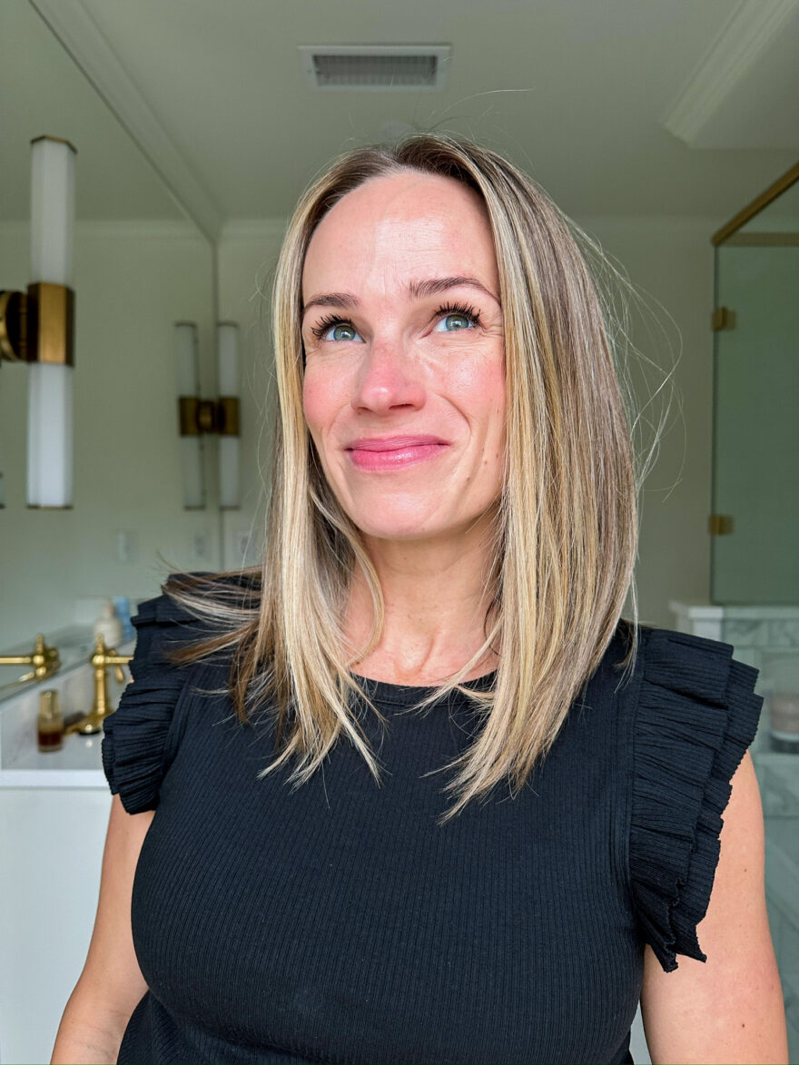 TeriLyn Adams showing her face after using The Minimalist Perfecting Complexion Stick from Merit Beauty