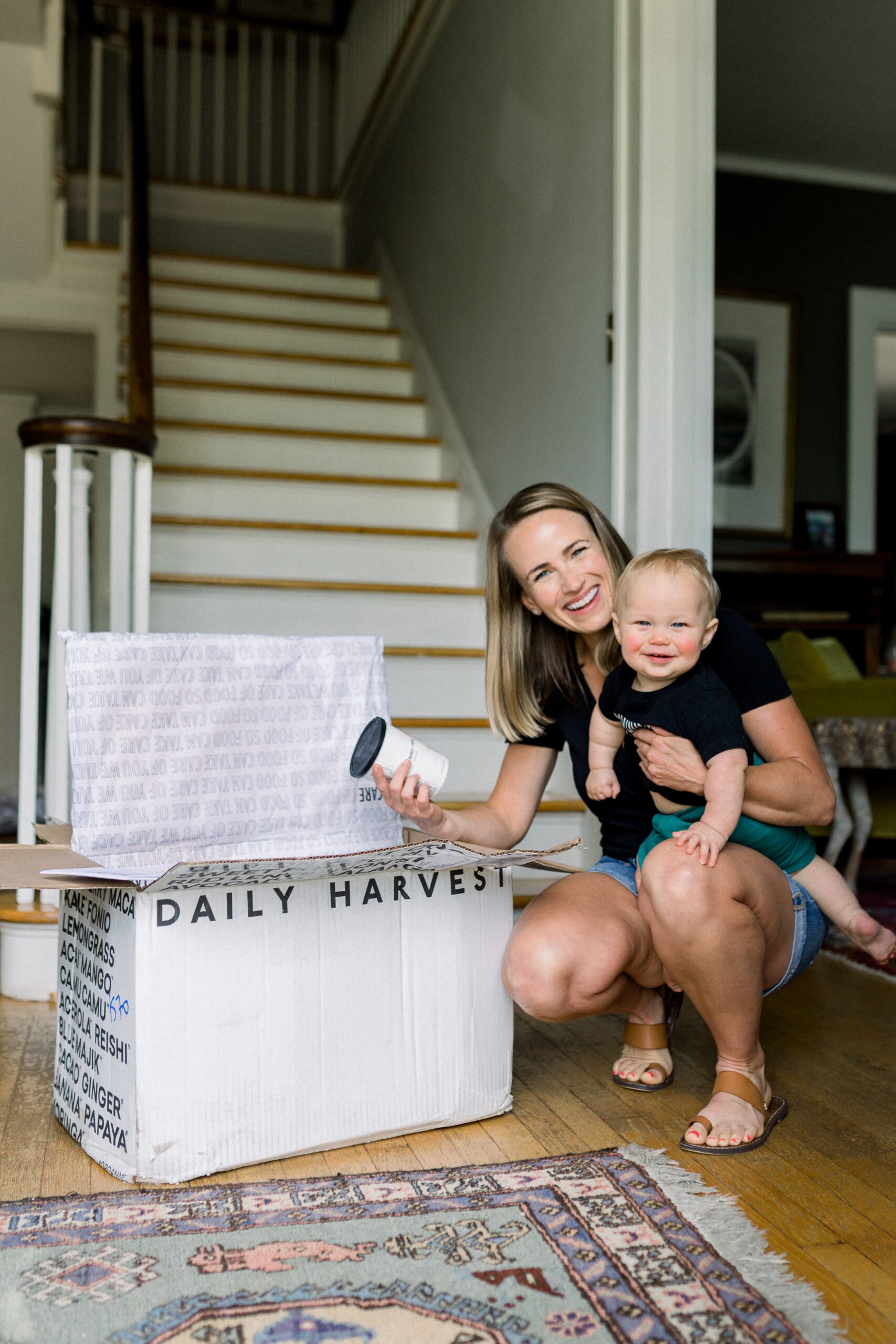 Daily Harvest Smoothie Review with woman holding baby