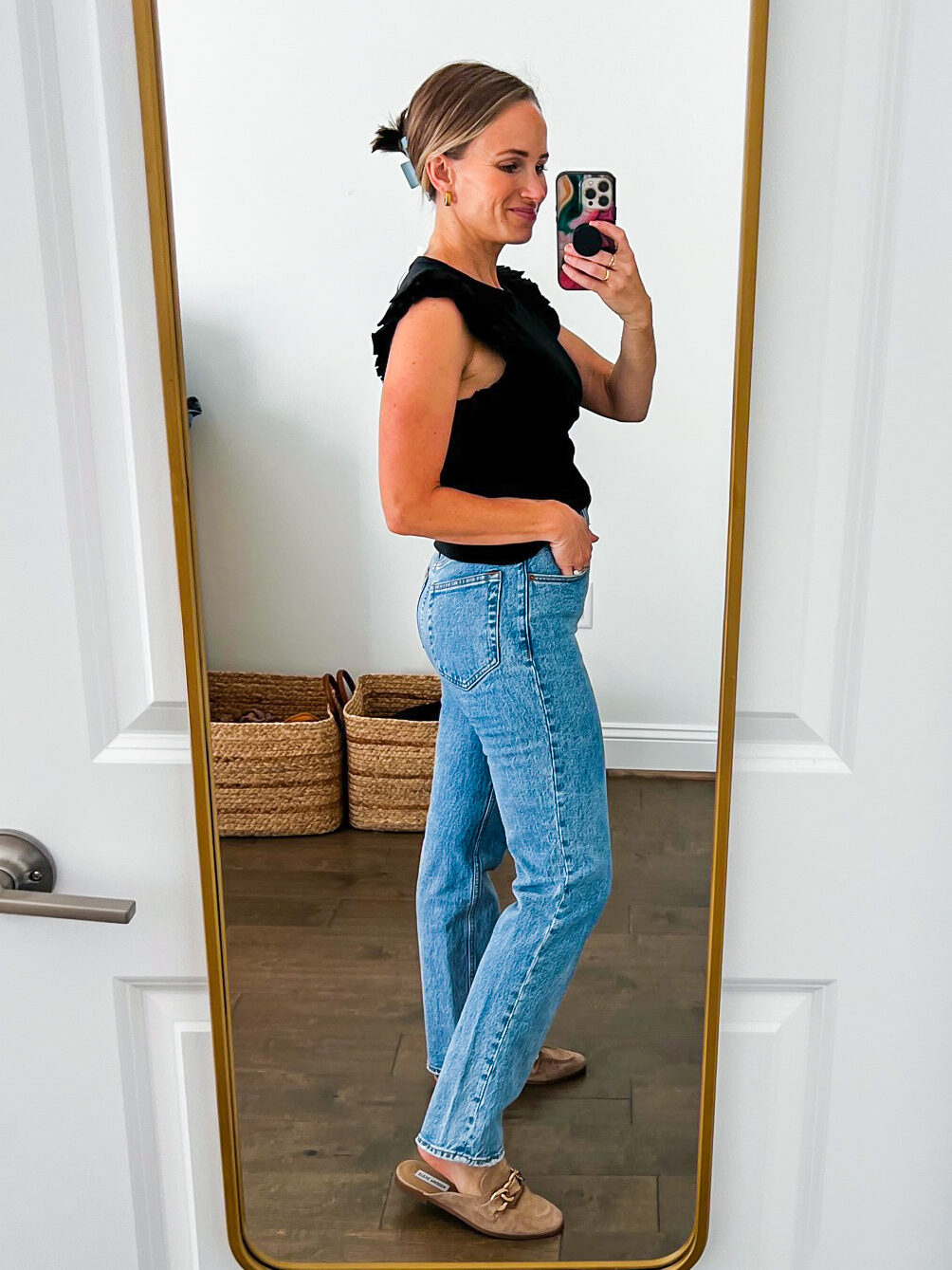 TeriLyn Adams showing the side details of the Ultra High Rise 90s Straight pants
