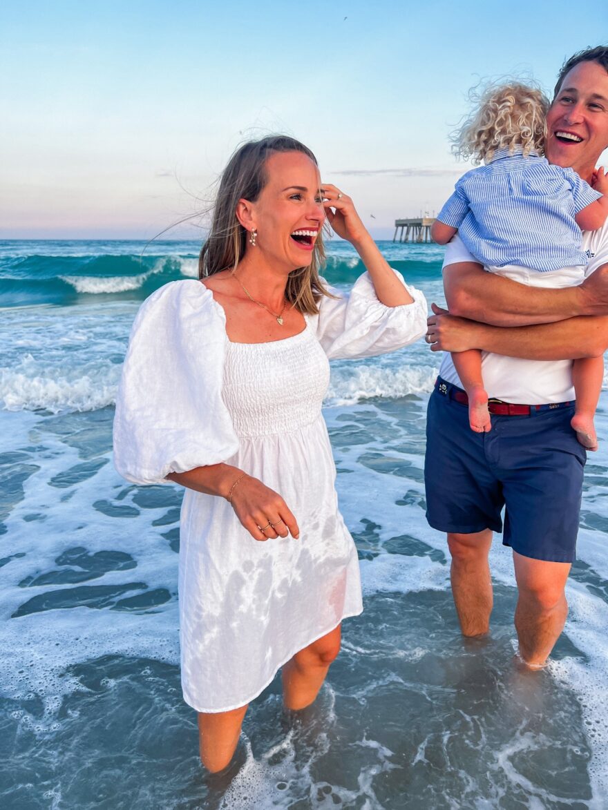 TeriLyn Adams at the beach and wearing Annie Smocked Dress