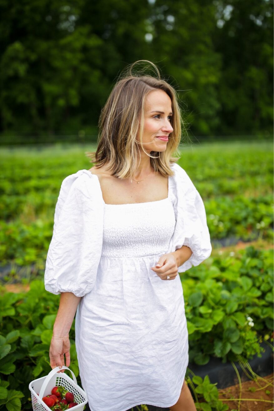 TeriLyn Adams wearing white Annie Smocked Dress