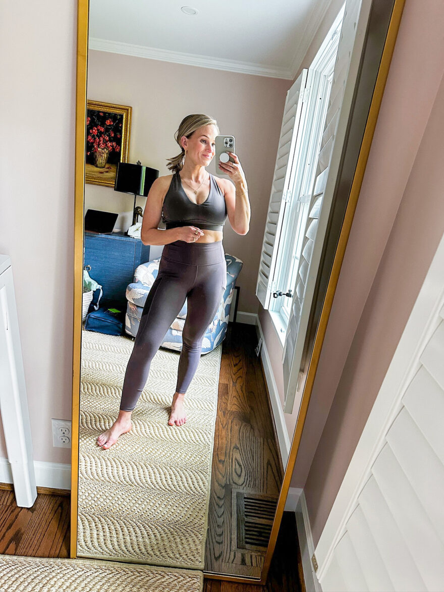 TeriLyn Adams wearing Fabletics' All Day Every Day Low Impact Bra with On-The-Go Powerhold High-Wasted Legging