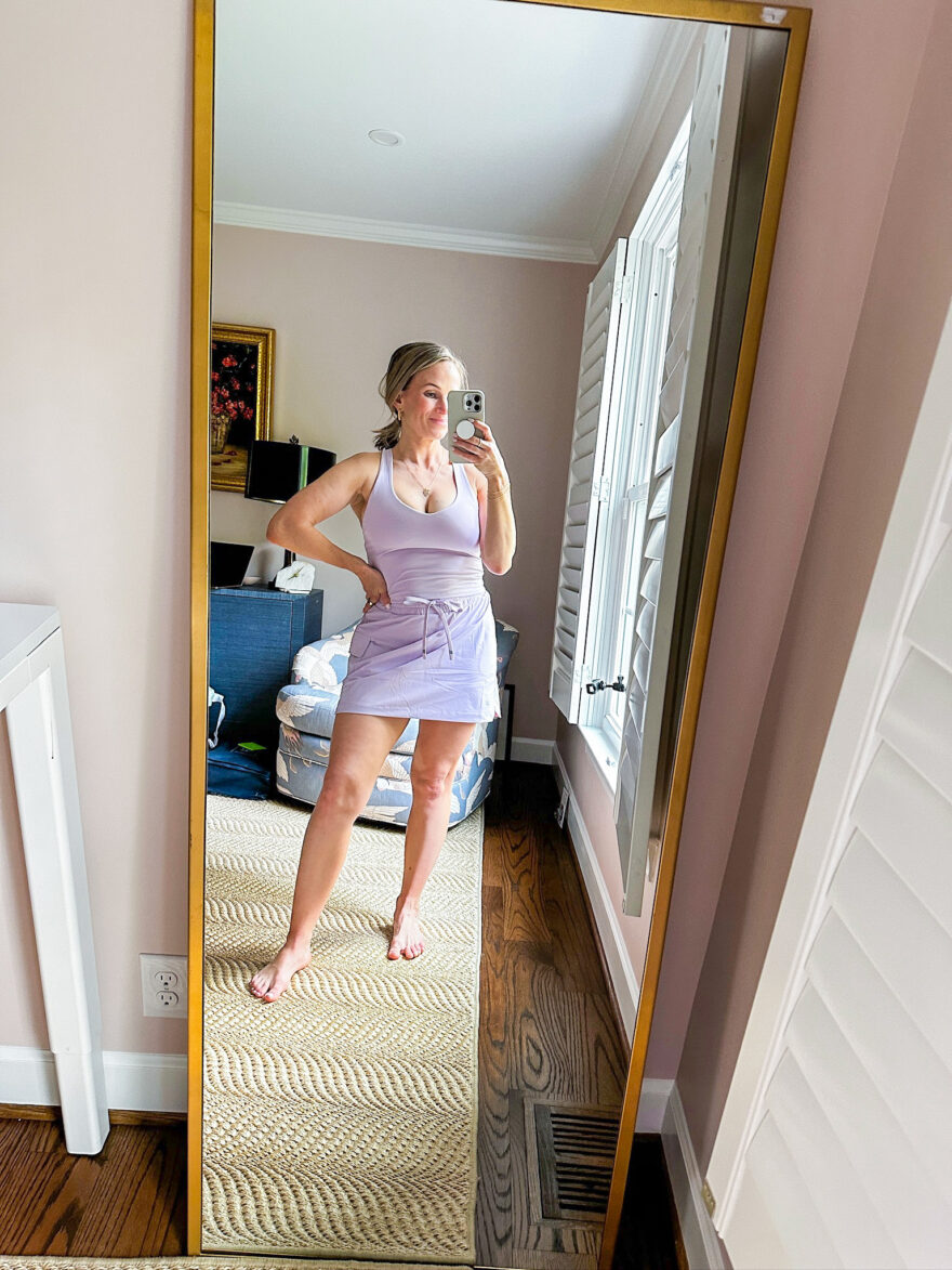 TeriLyn Adams wearing Anywhere Built-In Bra Tank with the One Cargo Skirt in lavender from Fabletics