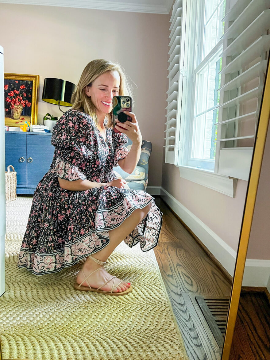 TeriLyn Adams wearing floral dress and sandals