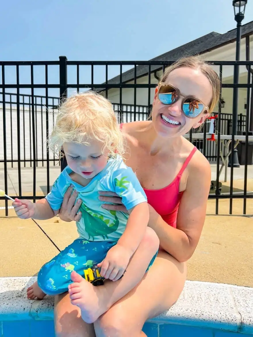 Woman with her son at the pool